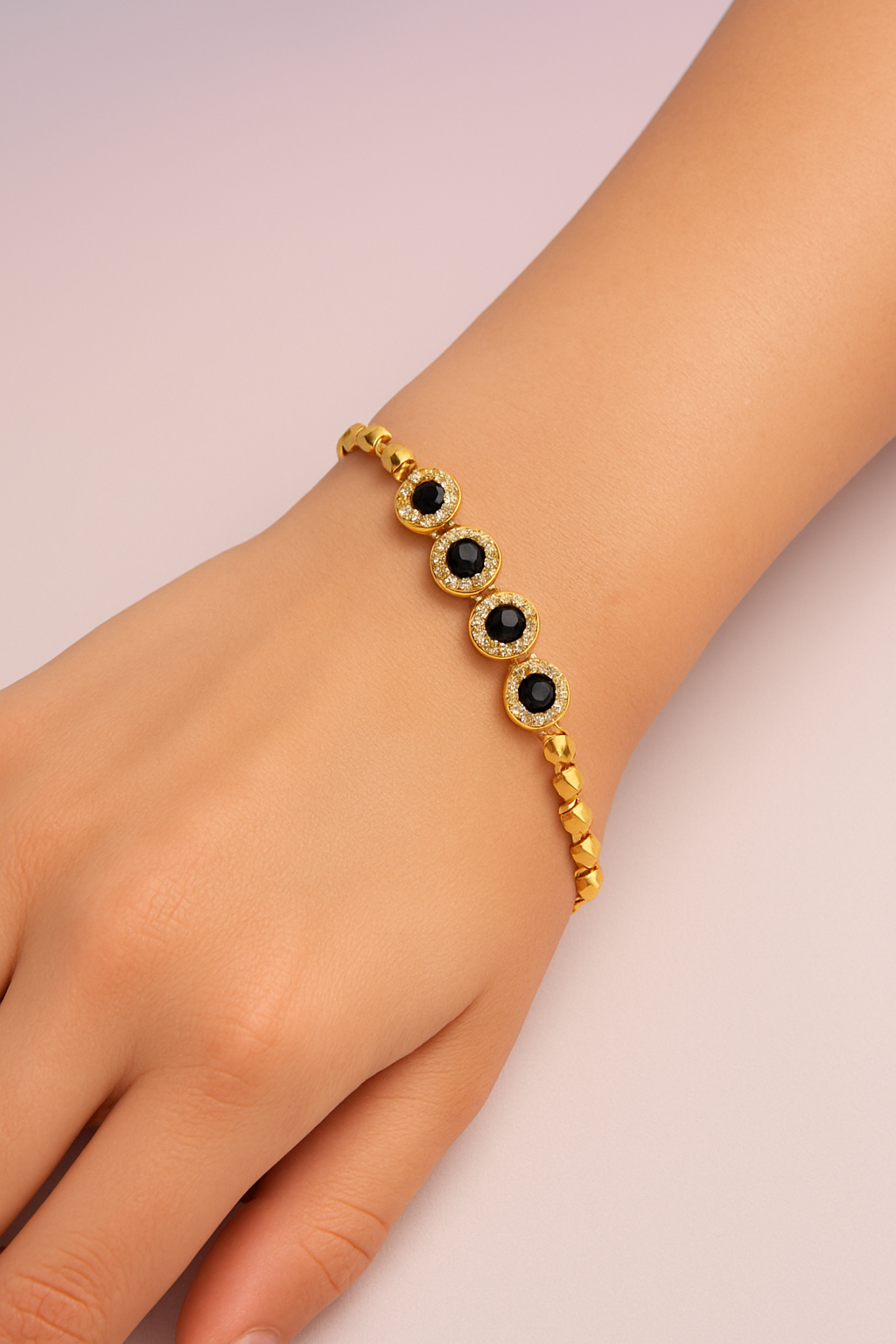 Gold Plated Bracelet with Black Gemstones & Heart Link Design